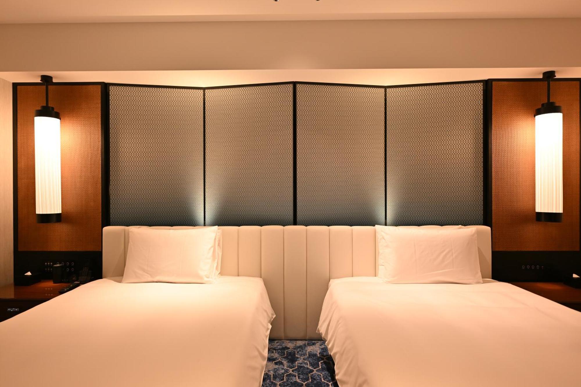 Ryukyu Hotel & Resort Nashiro Beach Itoman Exteriör bild A room at the hotel